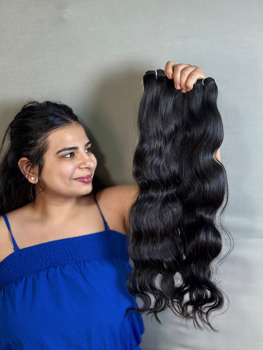 Cheveux indiens vierges, boucles ondulées.