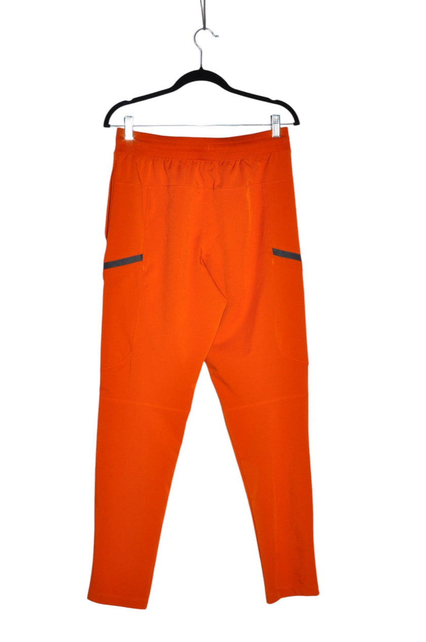 UNDER ARMOUR Women Activewear Joggings Regular fit in Orange - M