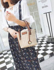 Women's bag hand-woven contrast color bucket straw bag cylinder handbag diagonal shoulder beach bag