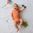 Baby Short Sleeve Bamboo Onesie | Orange Smilies