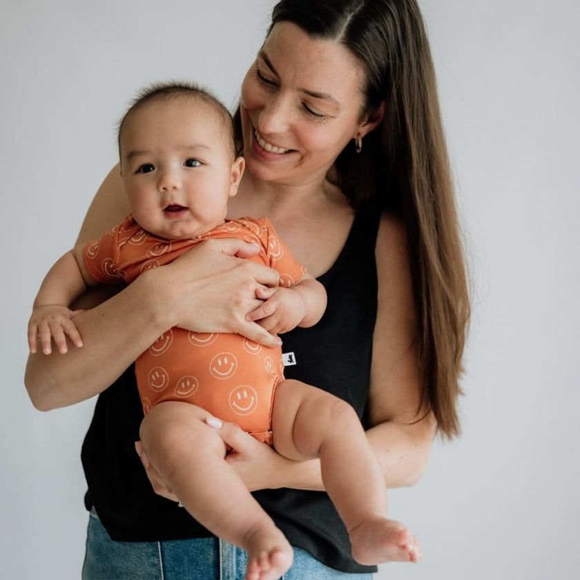 Baby Short Sleeve Bamboo Onesie | Orange Smilies