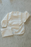 Bavette à manches longues imperméable avec poche | 6-24 mois