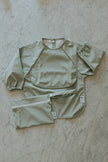 Bavette à manches longues imperméable avec poche | 6-24 mois