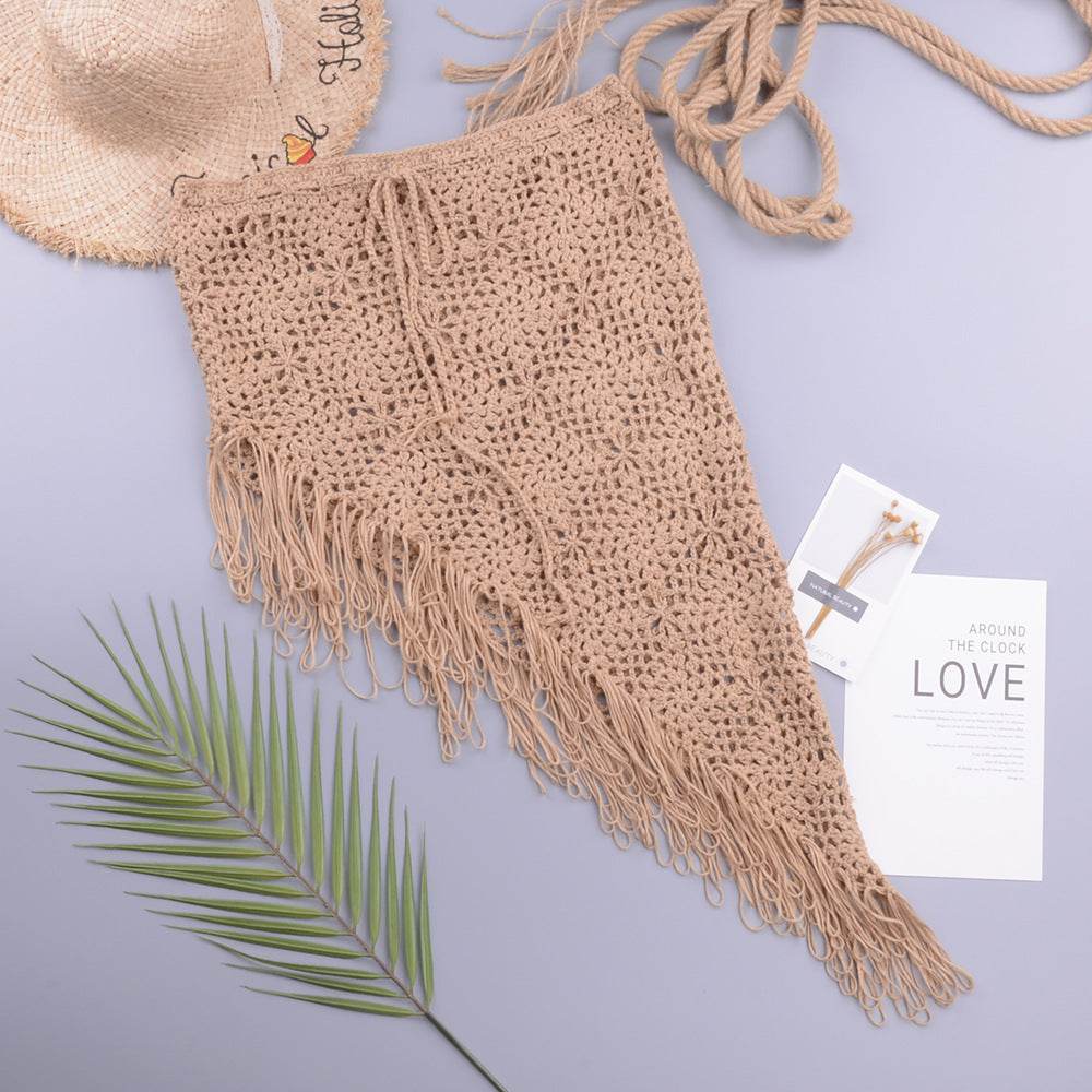 European And American Women's See Through Hollow Knitted tassel fringe Slant Beach Skirt
