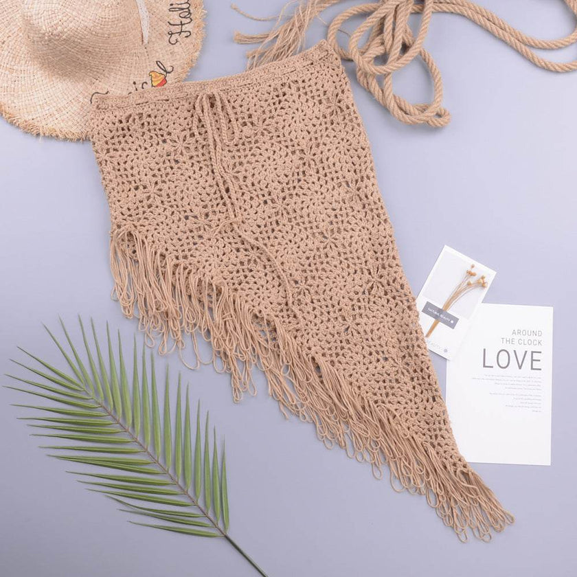 European And American Women's See Through Hollow Knitted tassel fringe Slant Beach Skirt