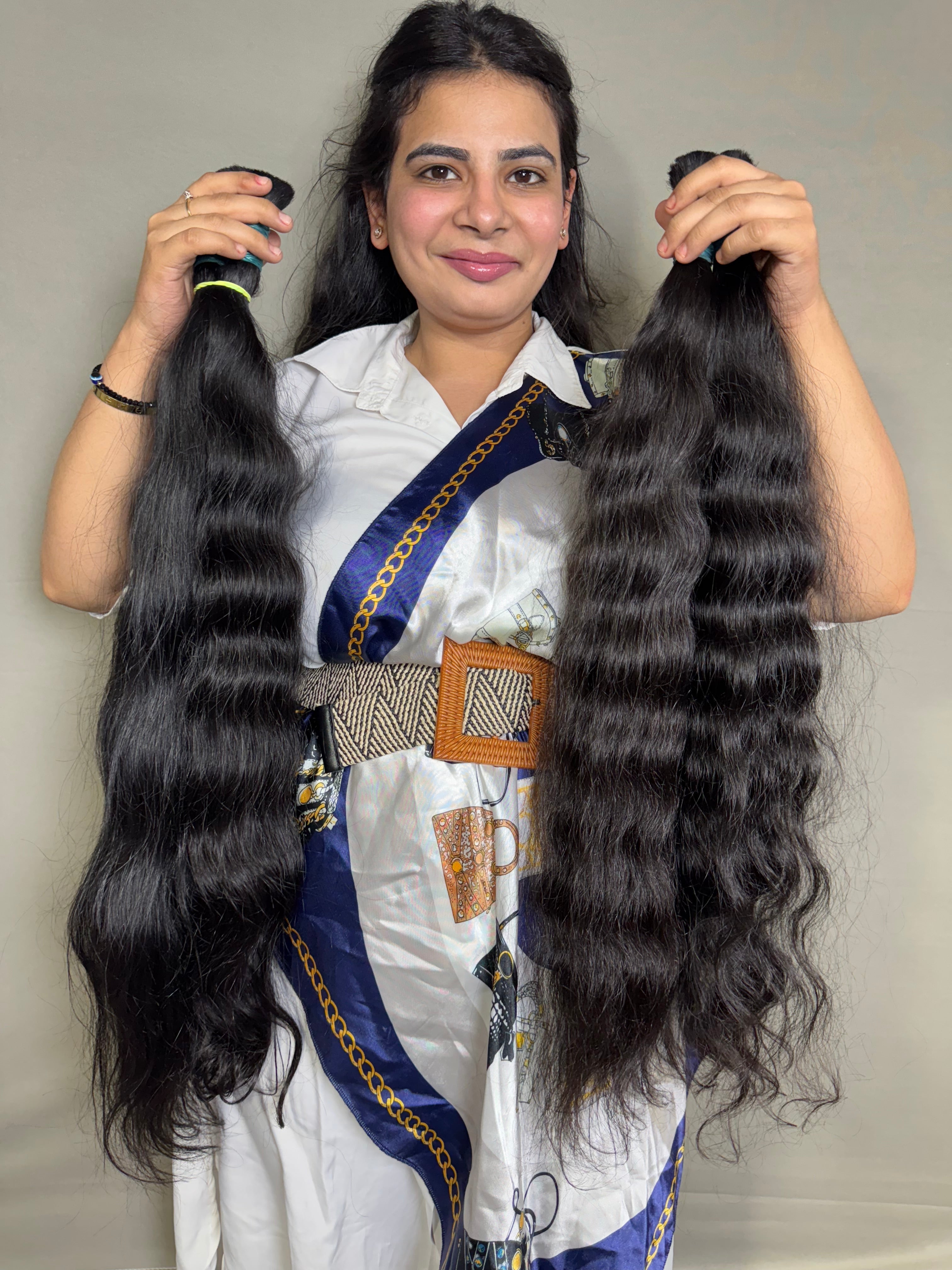 Cheveux en vrac, bouclés, de qualité supérieure, originaires d'Inde.