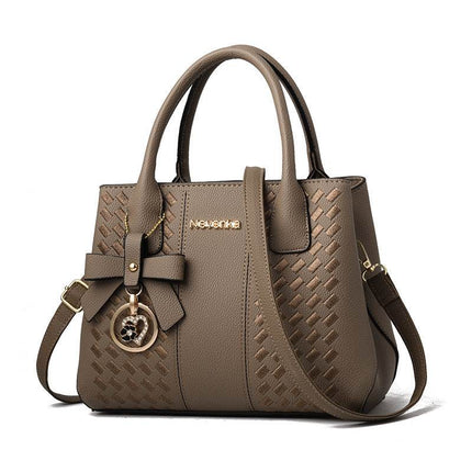 Affordable Luxury formal Handbag PU Leather Made.