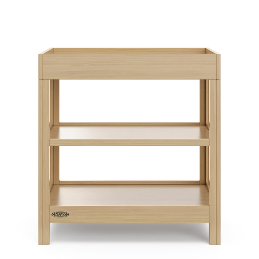 Graco Teddi Changing Table with Water-Resistant Changing Pad (Driftwood) - GREENGUARD Gold Certified, 2 Open Shelves, Includes Bonus Water-Resistant Changing Pad with Safety Strap 🍁 All In One Marketplace Canada