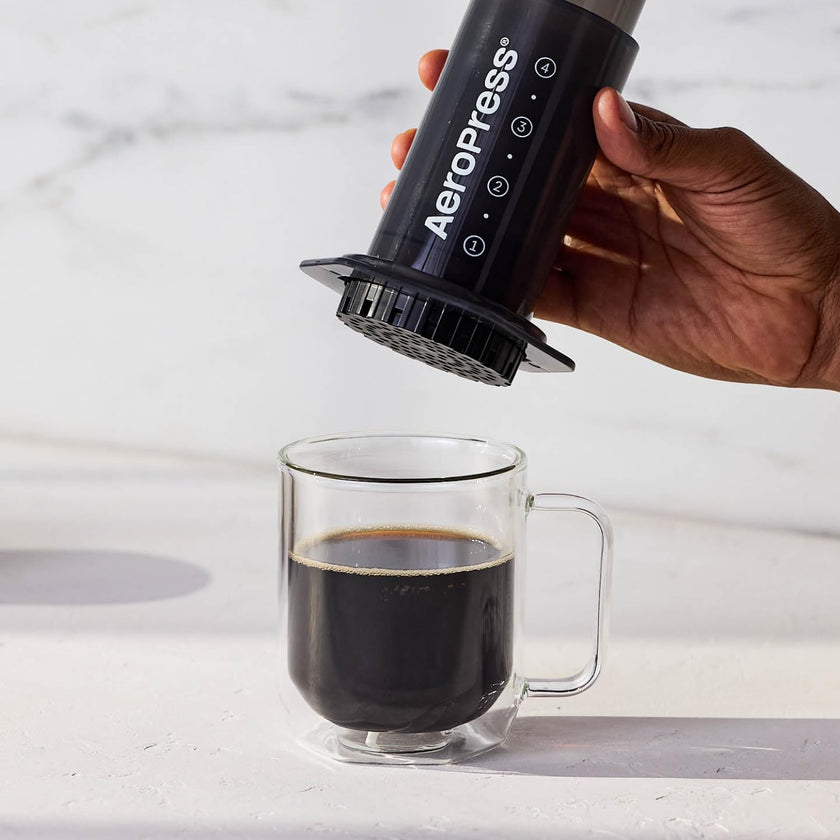 AeroPress Original Coffee Press - All-in-One French Press, Pour-Over & Espresso Style Manual Brewer, 2 Min Brew for Less Bitterness, More Flavor, Small Portable Coffee Maker, Travel & Camping 🍁 All In One Marketplace Canada