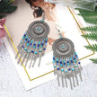 Beaded fringed hollow earrings