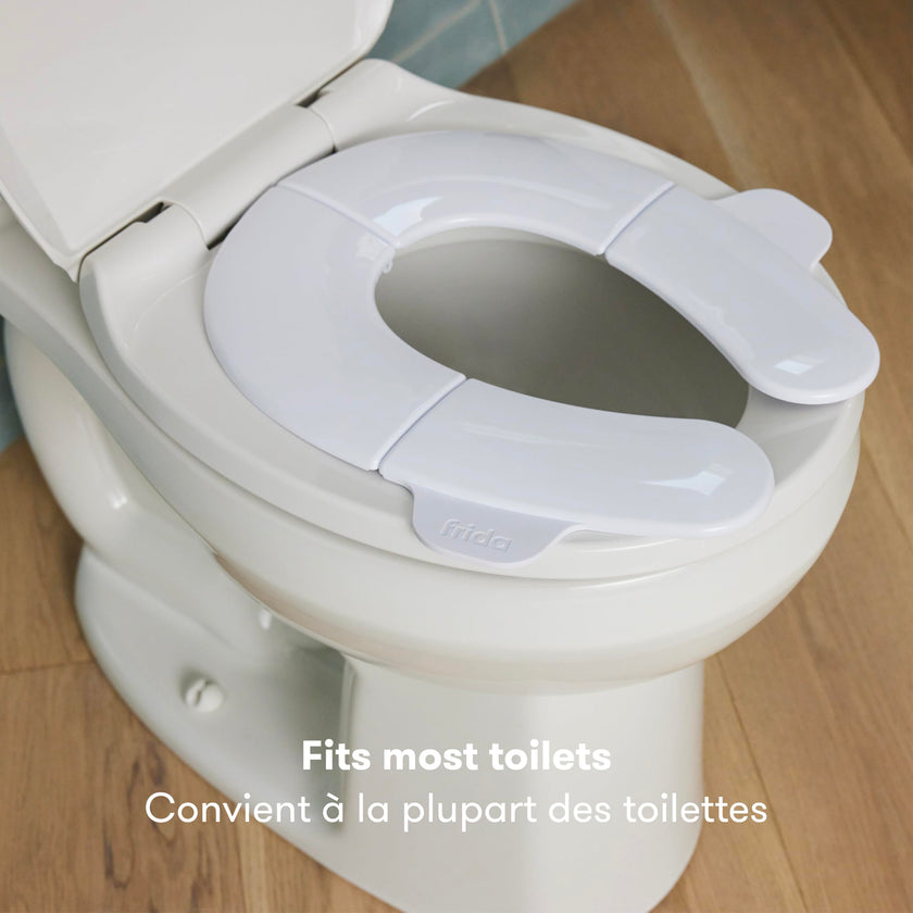 Frida Baby Fold-and-Go Potty Seat for Toilet, Foldable Travel Potty Seat for Toddler, Fits Round & Oval Toilets, Non-Slip Base, Handles, Includes Free Travel Bag 🍁 All In One Marketplace Canada