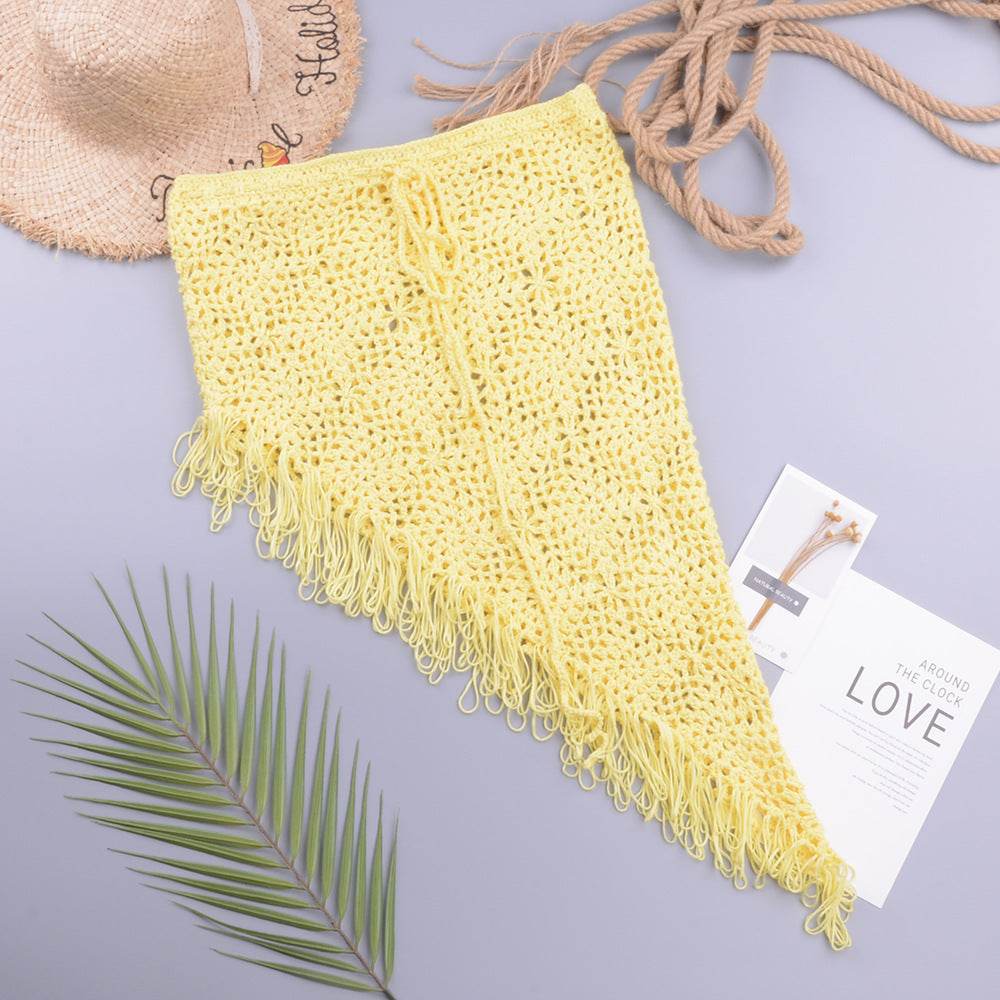 European And American Women's See Through Hollow Knitted tassel fringe Slant Beach Skirt