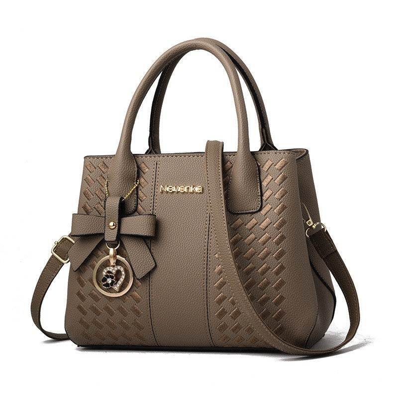 Affordable Luxury formal Handbag PU Leather Made.