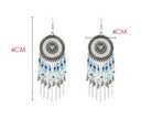 Beaded fringed hollow earrings