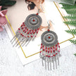 Beaded fringed hollow earrings