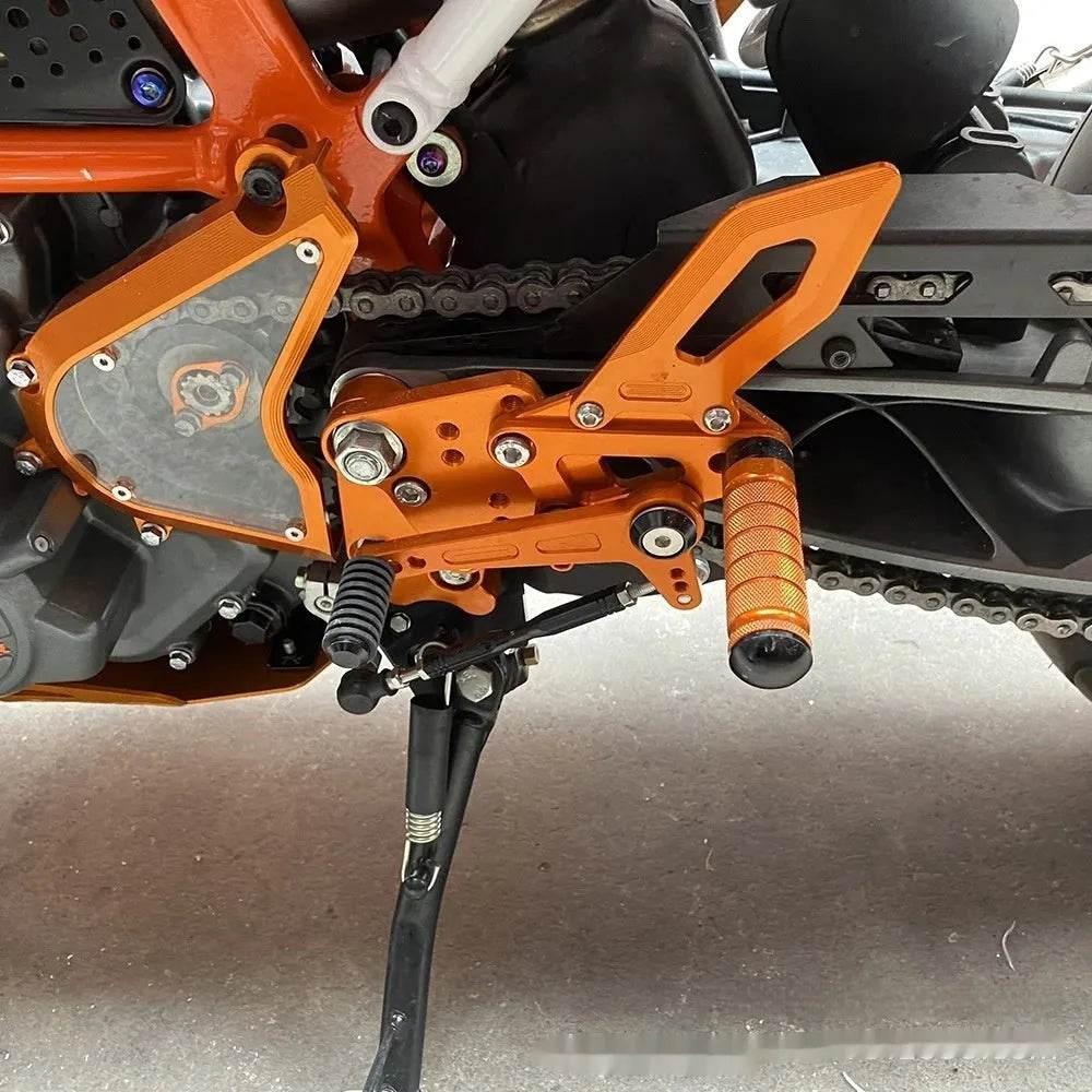 KTMDUKE 125200250390 Foot Pedal Bracket Support Assembly
