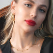VIGO : Collier en chaîne dorée avec perles ovales et rondes, simple et essentiel.