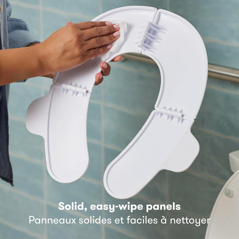 Frida Baby Fold-and-Go Potty Seat for Toilet, Foldable Travel Potty Seat for Toddler, Fits Round & Oval Toilets, Non-Slip Base, Handles, Includes Free Travel Bag 🍁 All In One Marketplace Canada