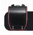 Kids Ergonomic Spine-Protecting School Backpack – Load-Reducing PU, 4 Colours