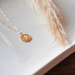 Sun ray opal evil eye necklace