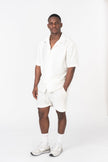 short blanc texturé