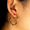 Boucles d'oreilles en forme de sculpture ADAMMA