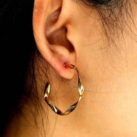 Boucles d'oreilles en forme de sculpture ADAMMA