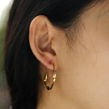 Boucles d'oreilles en forme de sculpture ADAMMA