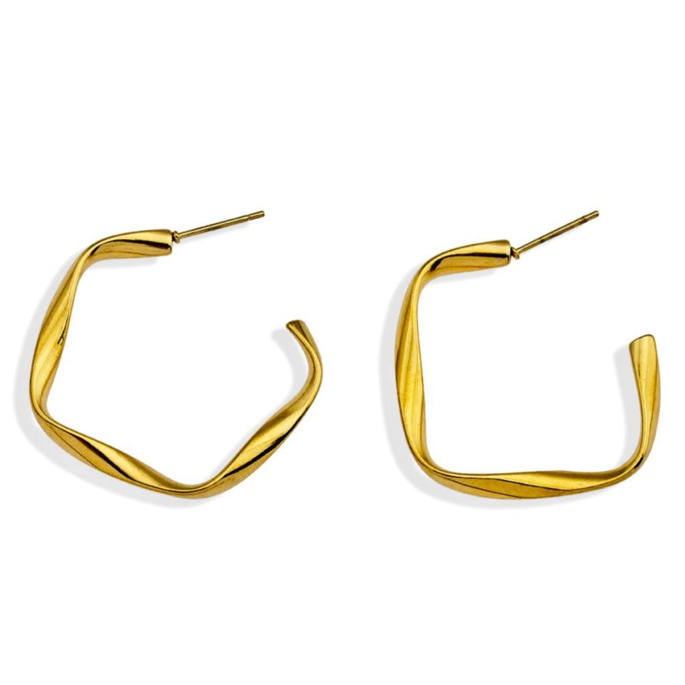 Boucles d'oreilles en forme de sculpture ADAMMA