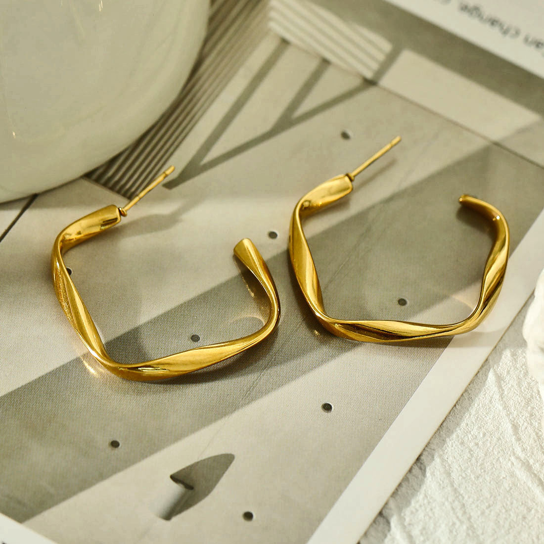 Boucles d'oreilles en forme de sculpture ADAMMA