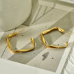 Boucles d'oreilles en forme de sculpture ADAMMA
