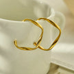 Boucles d'oreilles en forme de sculpture ADAMMA