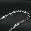 ALALA Silver Toned White Gold: Botanical Beauty Embossed Leaf Necklace