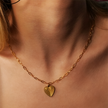 Style ALARA: Mini Paper Clip Chain Anchoring a Patterned Heart Charm in Gold
