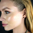 AMNISTY: 'Brilliant Star' Zirconia Stud Earrings Gold