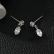 ANDALUSIA : Élégantes boucles d'oreilles pendantes en zircone (CZ) et chaîne en or blanc (ton argenté) – Un éclat intemporel pour toutes les occasions.