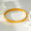 Style ATTILI : Bracelet minimaliste classique en or.