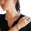 BAMBURG : Collier en chaîne argentée avec motif peau de serpent et étoiles en relief.