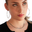 BAMBURG : Collier en chaîne argentée avec motif peau de serpent et étoiles en relief.