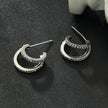 BOTTEGA: Double Banded Pavé Zirconia (CZ) Gemstones Embedded Hoop Earrings in Silver