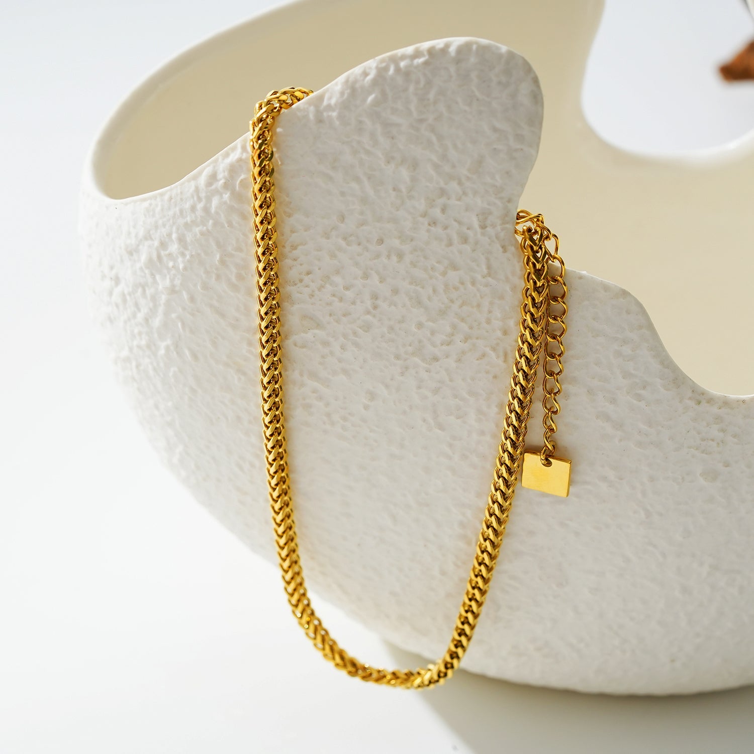 BRIELLA LG : Bracelet de cheville en chaîne cubaine dorée