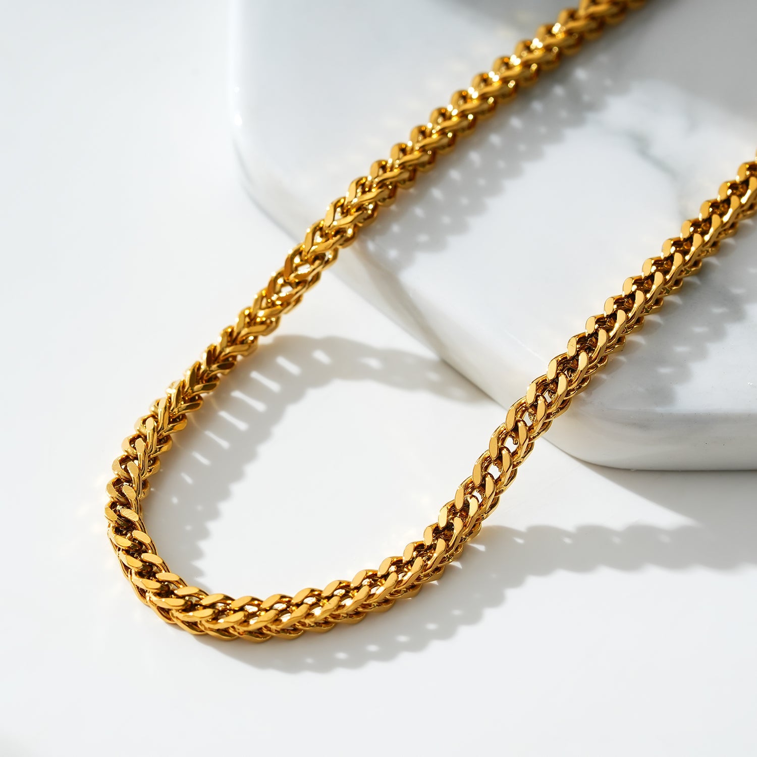 BRIELLA LG : Bracelet de cheville en chaîne cubaine dorée