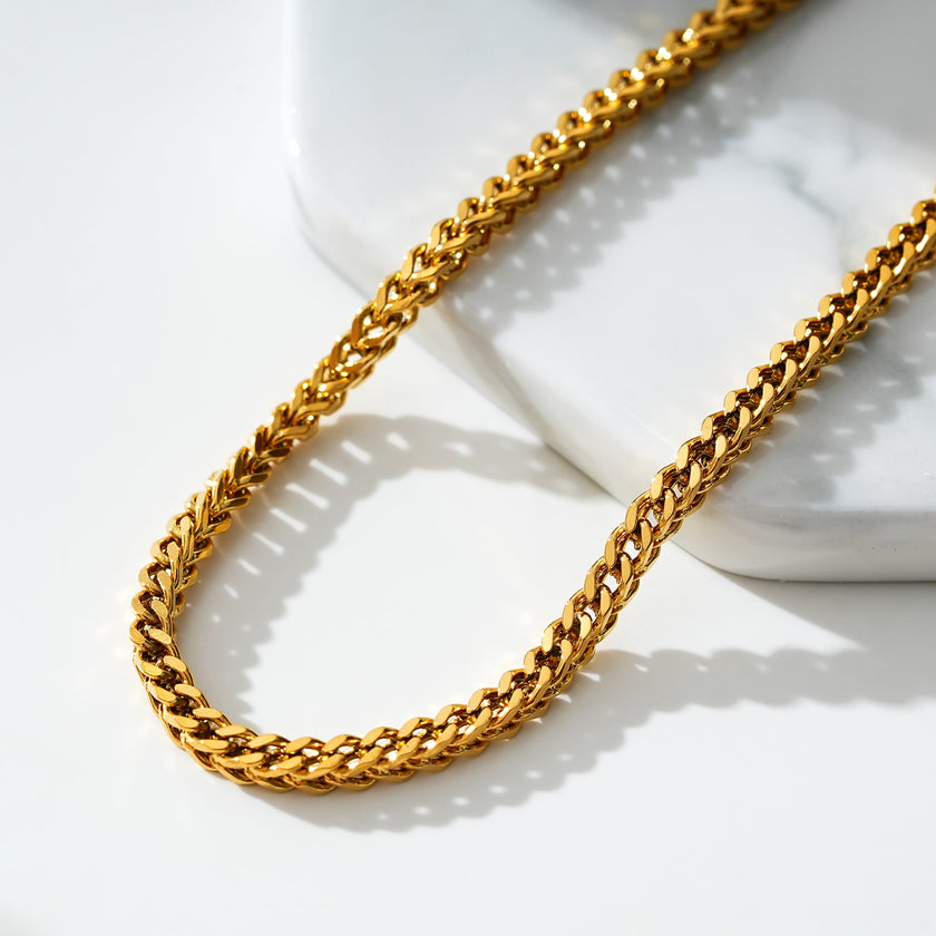 BRIELLA LG : Bracelet de cheville en chaîne cubaine dorée