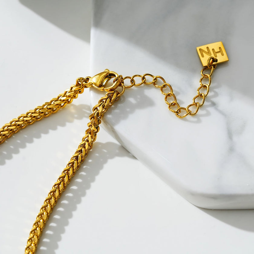 BRIELLA LG : Bracelet de cheville en chaîne cubaine dorée