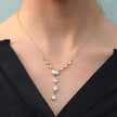 Style BUCKIE : Collier avec plusieurs pendentifs et chaîne en zircone.