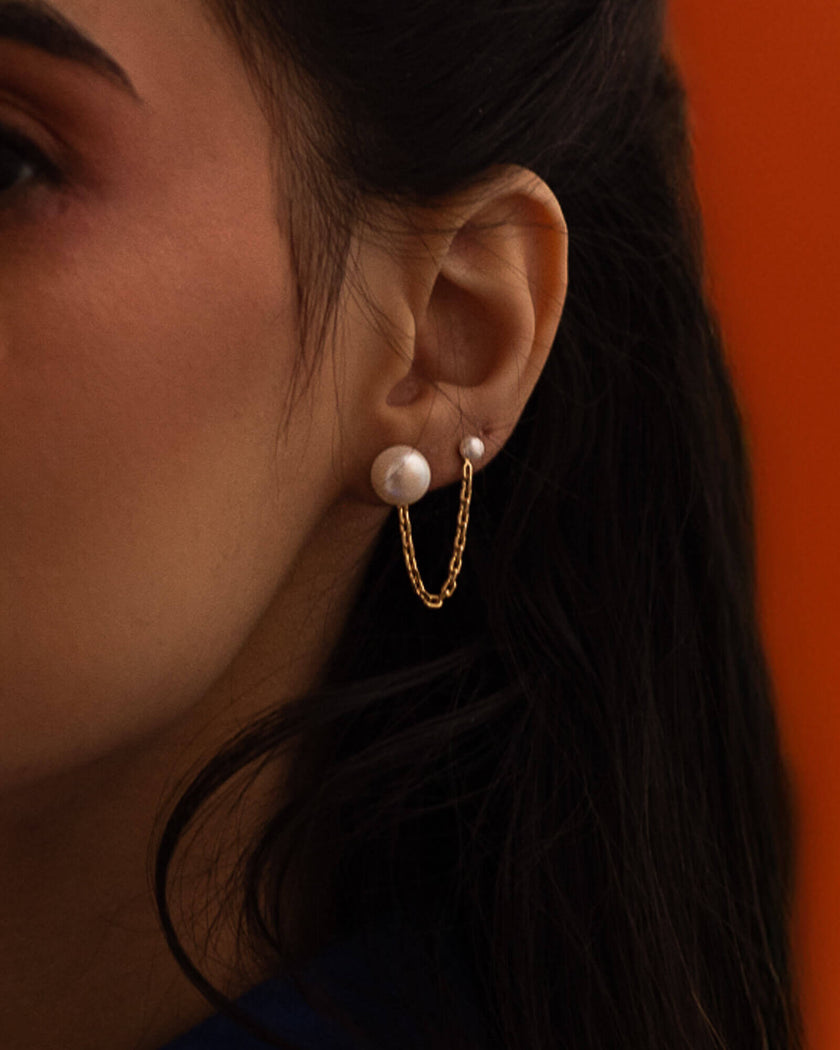 Étonnante - Boucles d'oreilles double trou avec perles et chaine