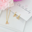 Vida Ribbon Bow Huggie Hoop Earrings