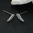 COMPTON Or Blanc (Ton Argenté) : Boucles d'oreilles en forme d'aile pavées de zircons scintillants – Élégance et brillance pour toutes les occasions.