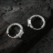 Style CONWYN: Retro Style Hoops with an Encased Clear Zirconia Charm in Silver.