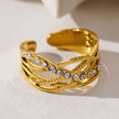 Style CORAZON : Bague à plusieurs anneaux entrelacés sertie de zircons.